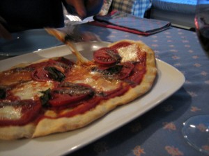 Pizza with Anchovies and Tomatoes