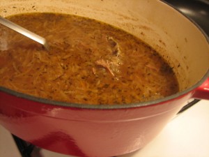 french onion soup cooking in cast iron enameled pot