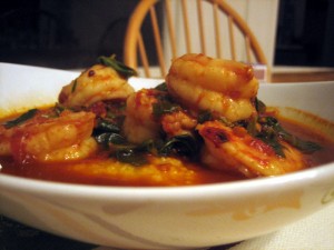 home made gourmet shrimp and grits with chard